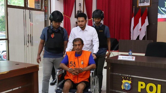 Tragedi Riau: Tampang Pria Bejat yang Bunuh Teman, Paksa Istri Threesome, dan Hancurkan Keluarga!